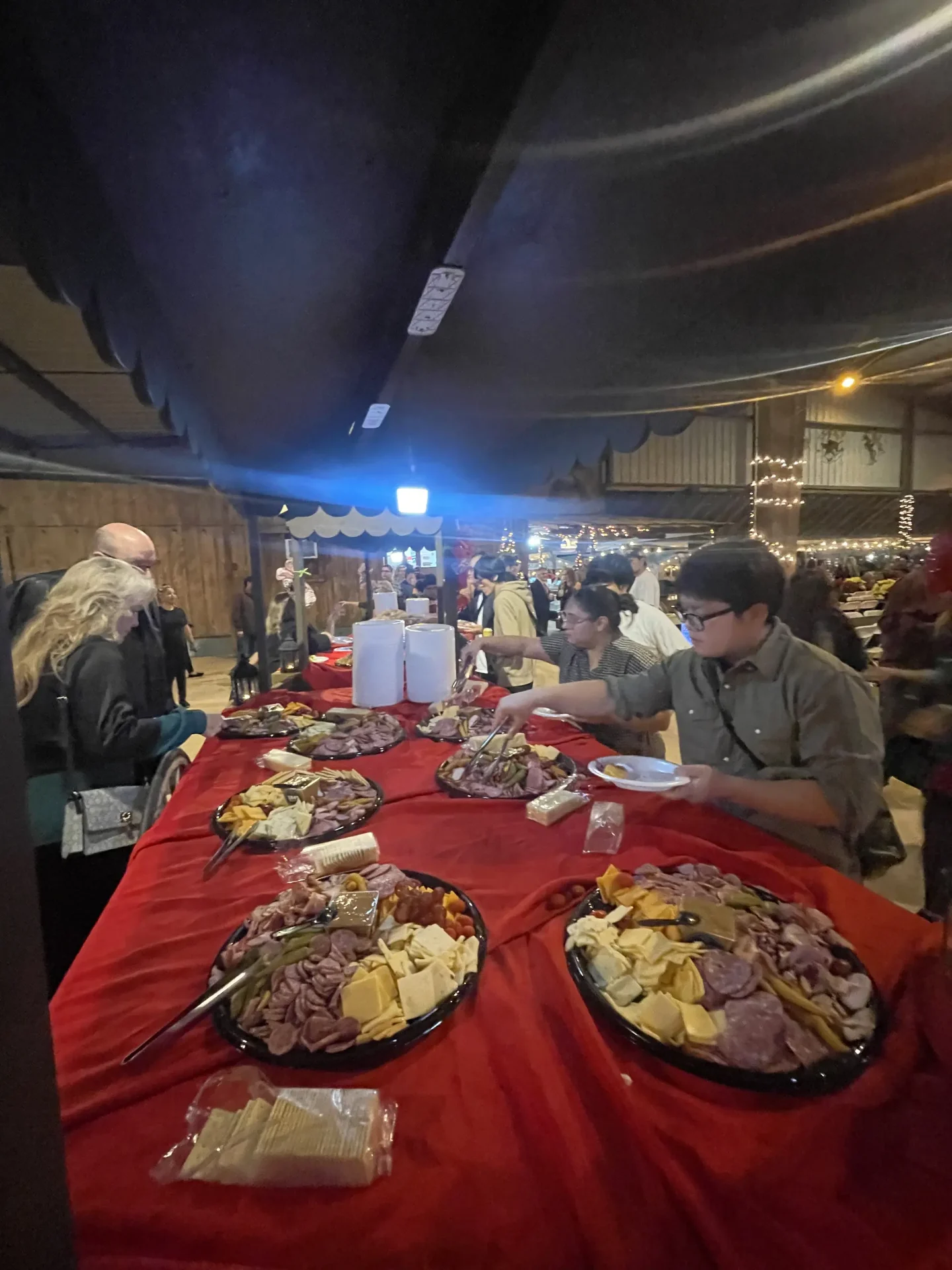 Charcuterie and appetizer buffet at a corporate holiday party at a Texas ranch venue
