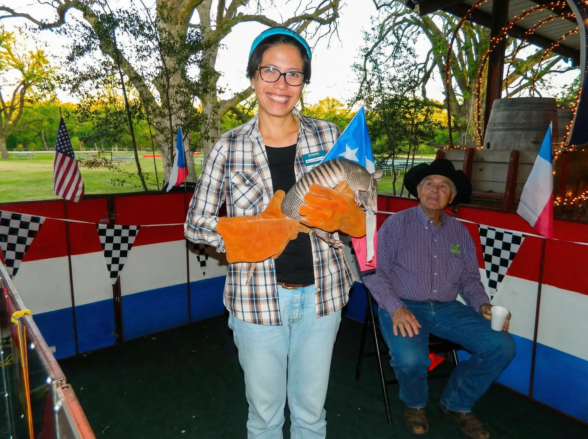 Coworkers in an armadillo race relay during corporate team building at Rio Cibolo Ranch