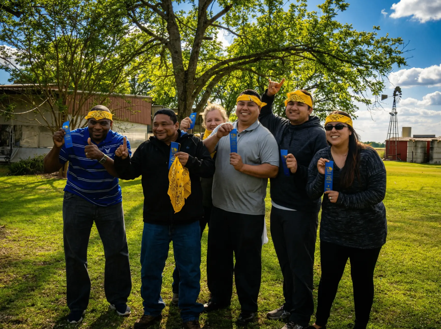 Winning corporate team-building group photo at a Texas ranch retreat venue